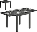 Table de Jardin Extensible en Aluminium Effet Bois avec Rallonge Auto-Rétractable, Noir - Pour 4 à 6 Personnes